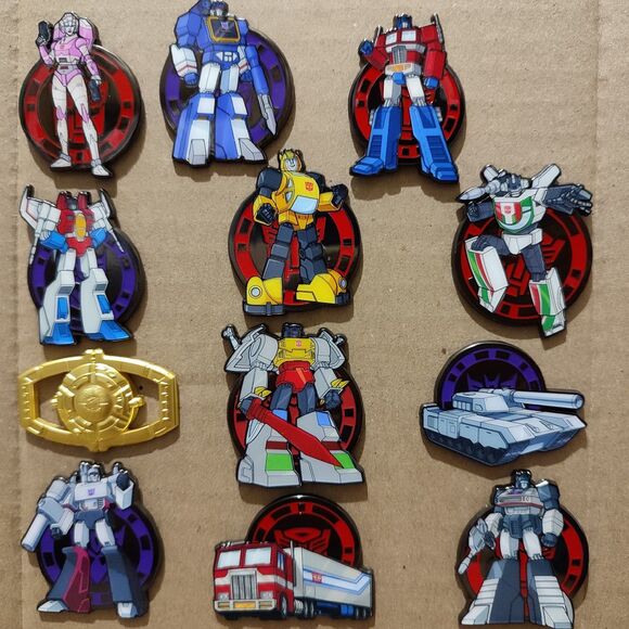 Transformers Mystery Pin Badge Series Full Set Of 12 Enamel Pins Official Badges - Picture 1 of 15
